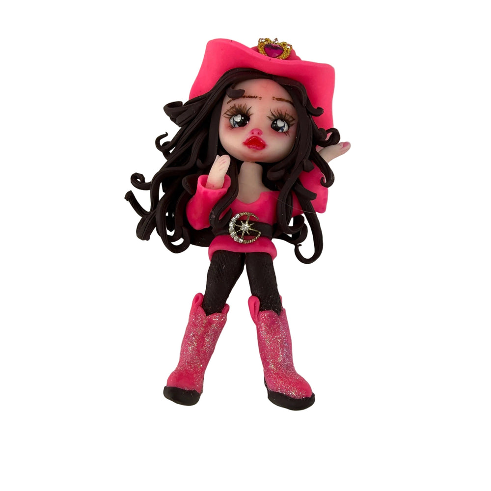 11.5cm rodeo queen cowgirl doll with wavy brown hair, expressive eyes and pink western outfit, handmade cold porcelain
