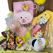 26-piece kawaii gift set for girls with journal, bracelet, keychain, lip balm and stationery in pink and yellow