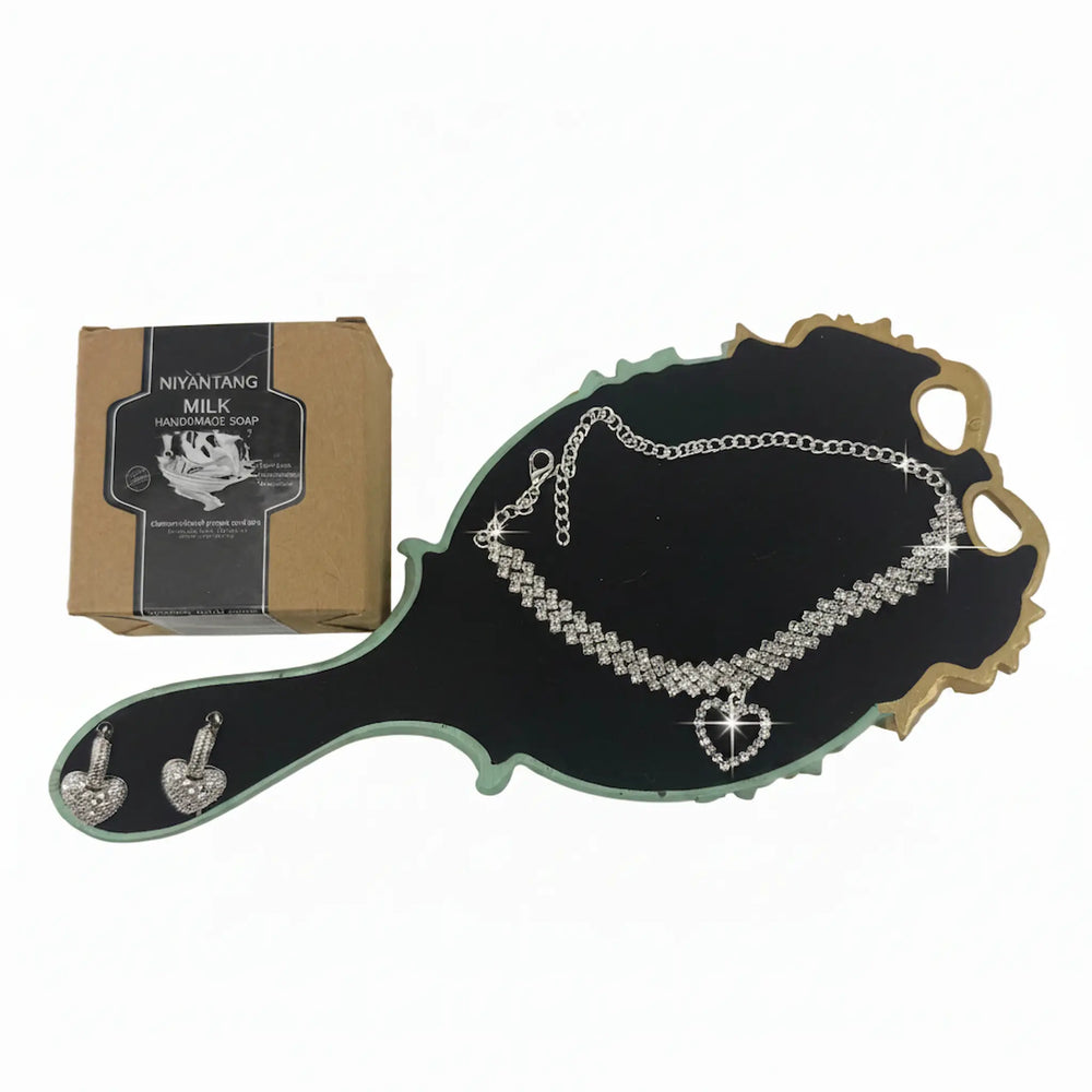 Vintage-style hand mirror, sparkling earrings and crystal anklet from women's self-care gift set