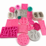 Assorted bundle of 22 moderately used multicolor silicone craft molds