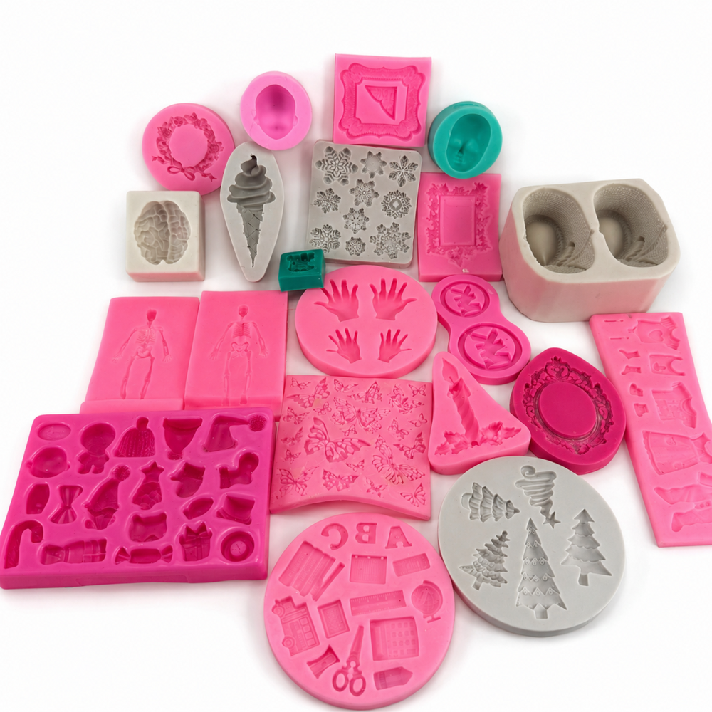 Assorted bundle of 22 moderately used multicolor silicone craft molds