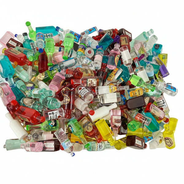 Assorted mini acrylic bottle charms in mixed colors and designs for DIY jewelry crafts