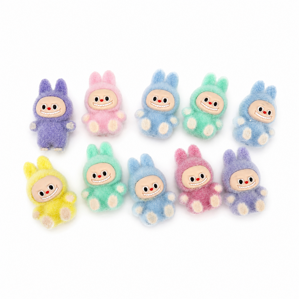 Assorted mini fuzzy bunny figures in pastel colors shown as examples for a random five-piece set