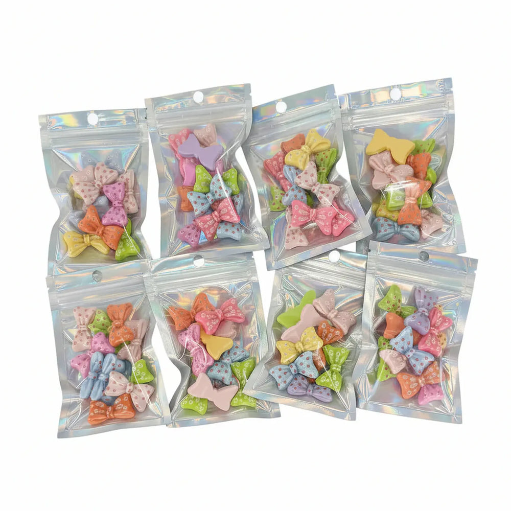 Assorted multicolor acrylic bows for DIY crafts, 10 pieces in resealable bag