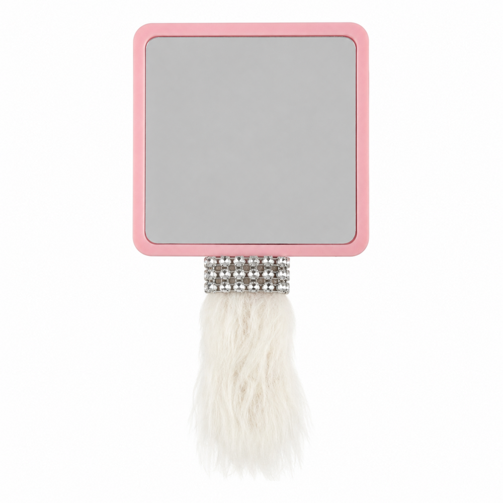 Back of small pink decorated hand mirror with handmade clay doll, faux pearls, rhinestones, flowers and starfish details