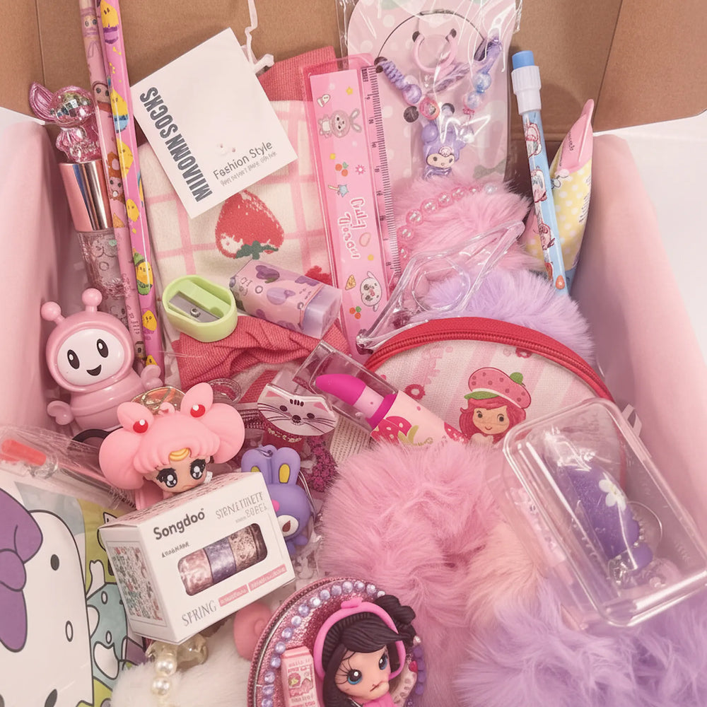 Birthday gift set for girls with kitty hair clip, puff hair ties, pom-pom keychains, stationery and hand cream