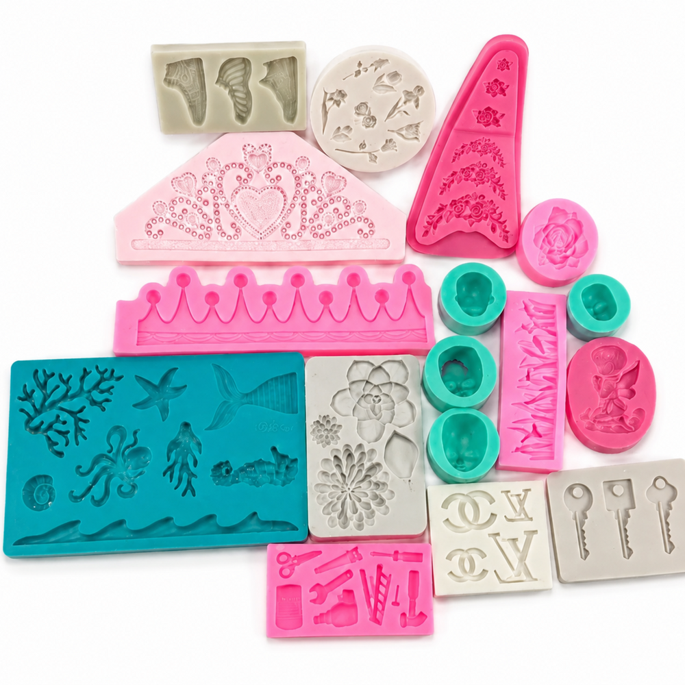 Bundle of 16 pre-owned silicone molds with ocean, floral and crown designs