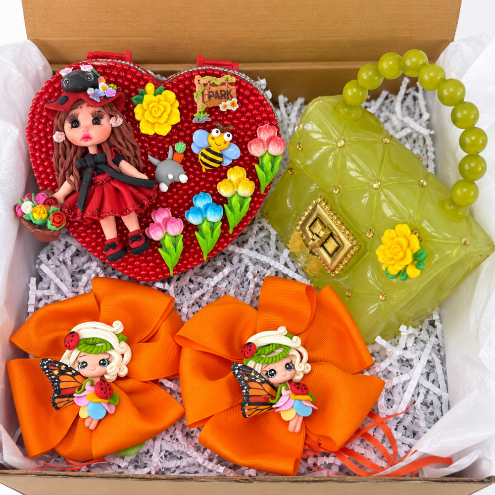 Butterfly fairy gift set with red heart jewelry box, yellow-green purse, and two large orange bows with fairy doll details.