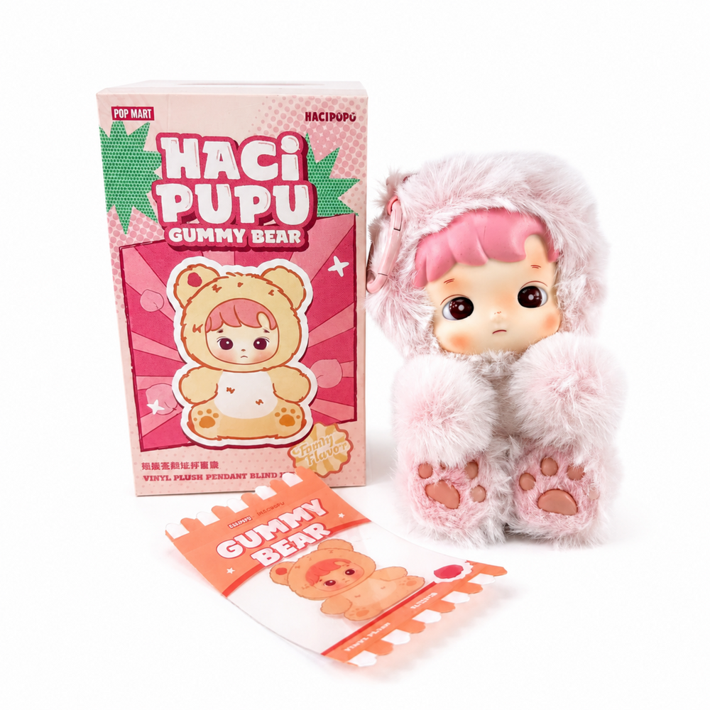 Close-up of Haci Pupu Gummy Bear Peach Flavor plush pendant with fluffy bear outfit, box, and Peach Flavor card.