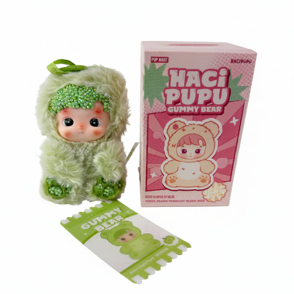 Close-up of hand-applied crystal bedazzled accents on Hacipupu Green Apple Gummy Bear plush pendant
