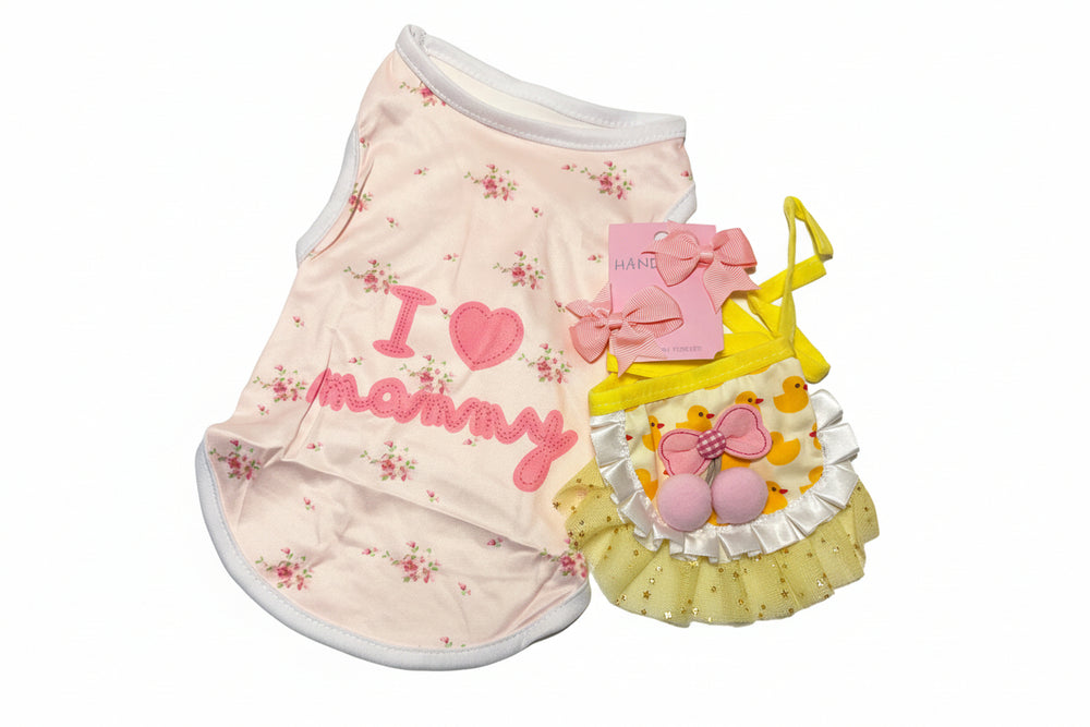 Close-up of pink striped pet shirt with I Love Mommy heart design and yellow ruffle tutu.