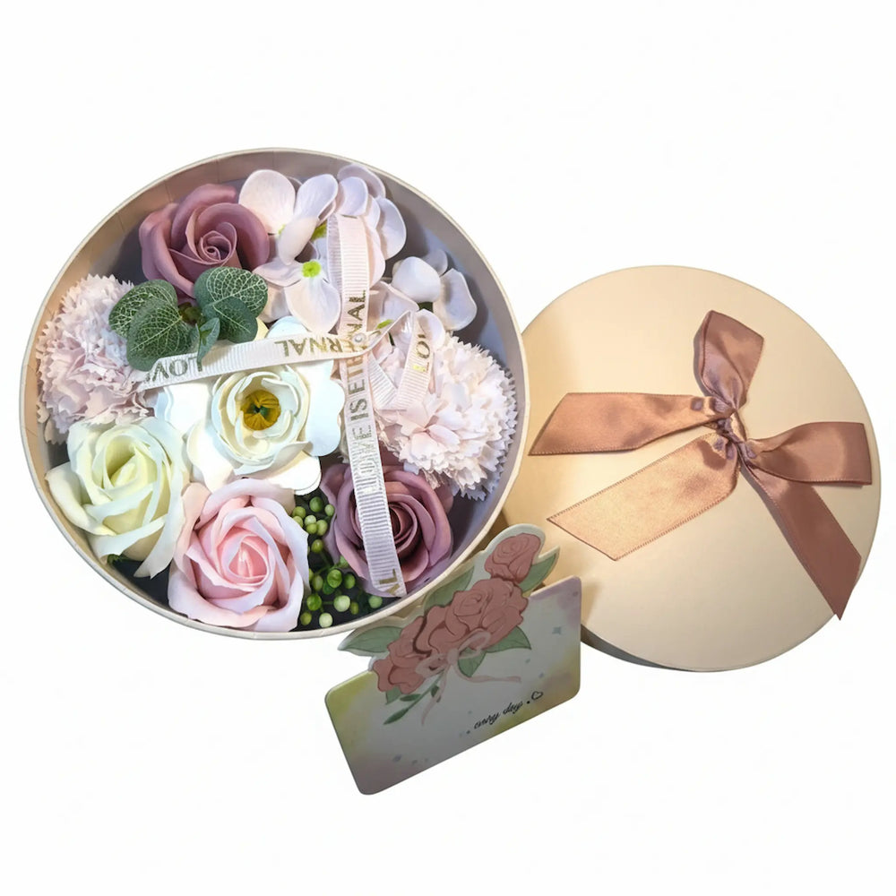 Close-up of rose petal hand soaps with floral packaging