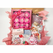 Coquette birthday gift box with pink rhinestone flask and soap roses