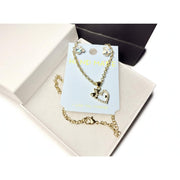 Crystal teddy bear earrings and rhinestone heart pendant close-up