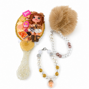 Decorated vanity mirror with dessert details, pearl charm and tan pom pom