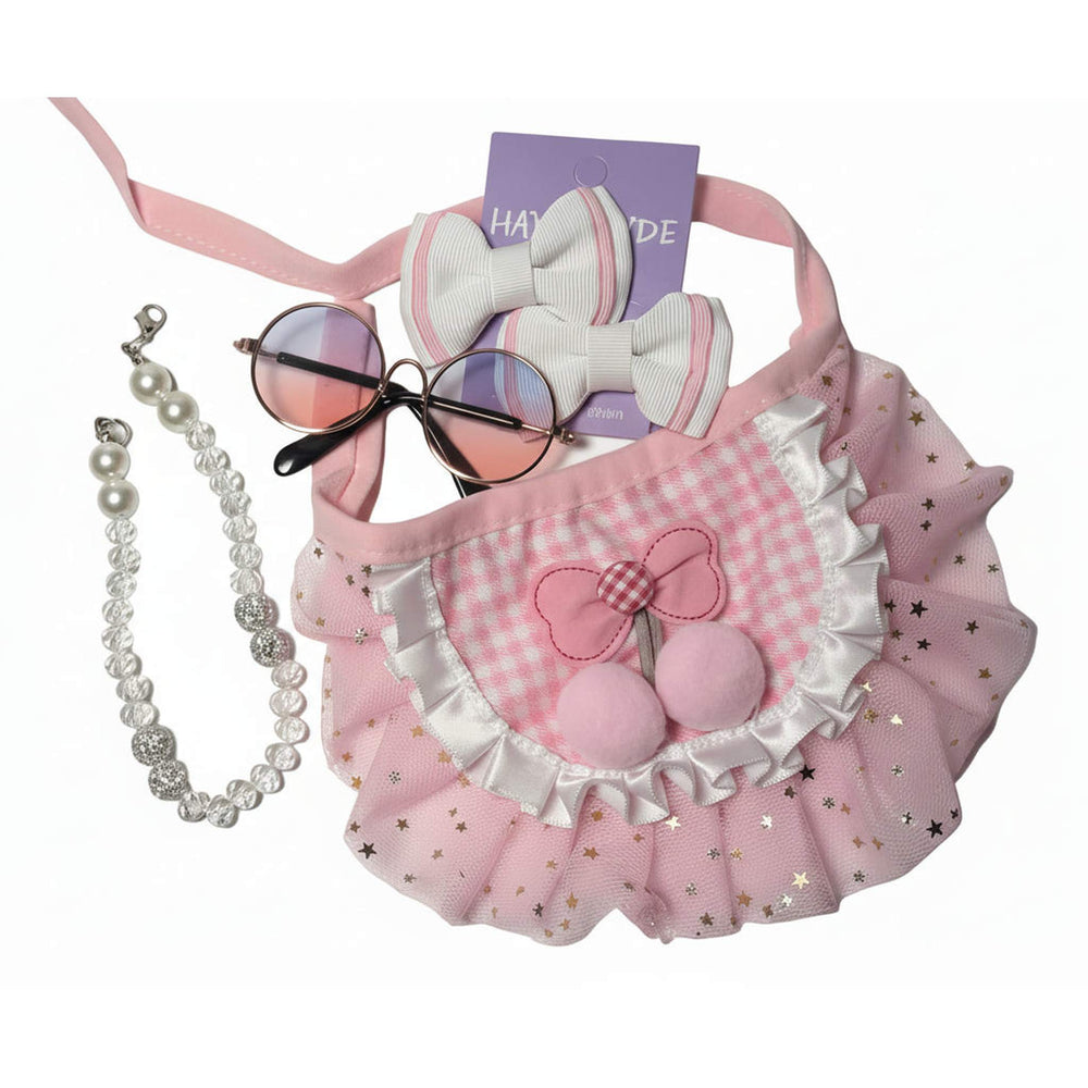 Detailed view of a fluffy pink dog tutu skirt and boutique hair bows, part of a coordinated 4-piece pet accessory set