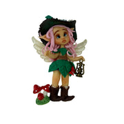 Elf figurine with pink hair, green outfit, and fairy wings 
