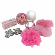 Flat lay of women's beauty gift set with bear hair clips and compact mirror
