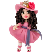 Flex porcelain fashion doll with green eyes, brown curls, pink glitter dress, lavender sash, and floral hat