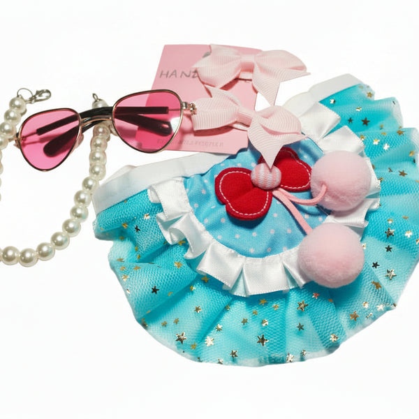 Full 4-piece princess pet set: blue cherry tutu, pink pearl collar, heart sunglasses, and bows.