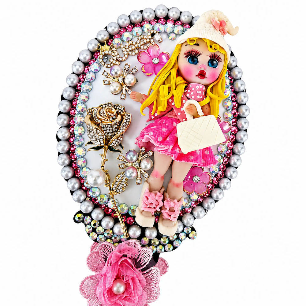 Full kawaii hand mirror with cold porcelain doll, pink flowers, pearls, rhinestones, and vanity embellishments.
