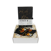 Gift set with a notebook, pen, and coasters in a box 