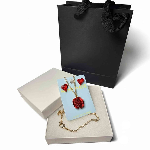 Gold-tone red rose pendant necklace and red crystal heart earrings jewelry set