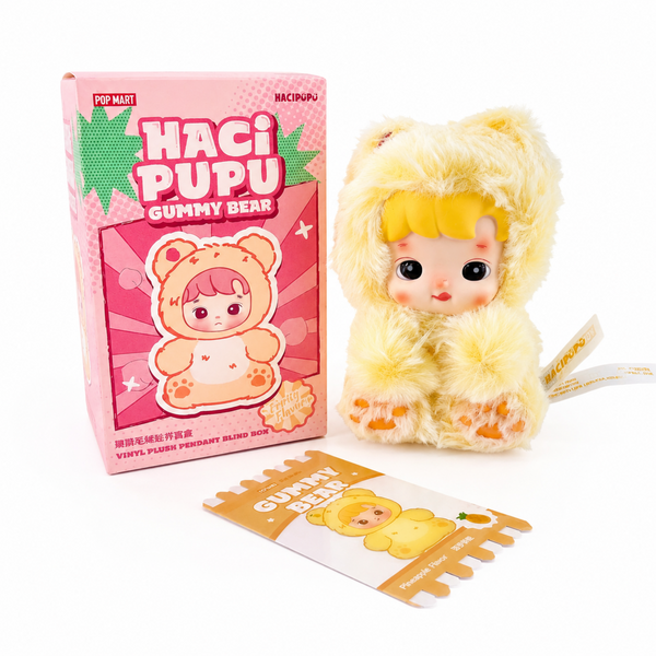 Haci Pupu Gummy Bear Pineapple Flavor yellow plush pendant with matching box and collectible insert card on white background