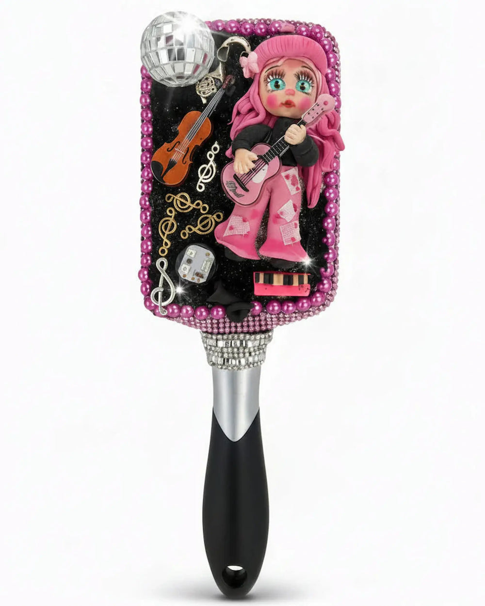Hairbrush with handmade country singer porcelain doll holding guitar, front view