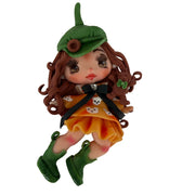 Handmade 9cm kawaii doll with green beret hat, olive boots, and a vibrant orange dress featuring a tiny bear design