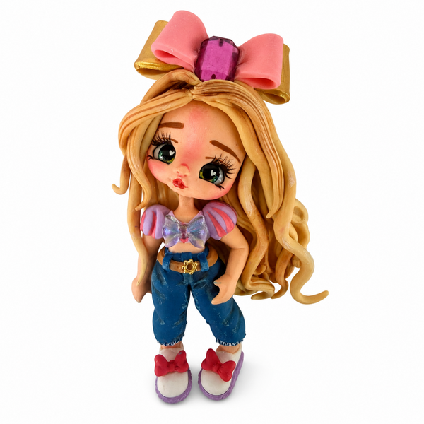 Handmade blonde doll centerpiece with long wavy hair, pink bow, denim outfit and colorful bow details.