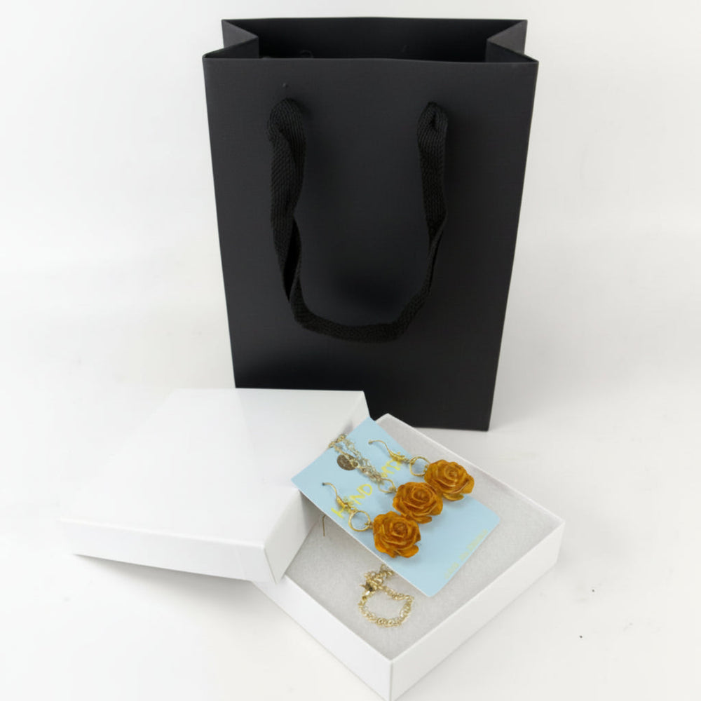 Handmade rose jewelry set with matching earrings and necklace displayed in a white jewelry gift box.