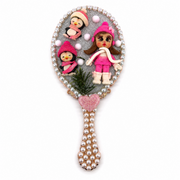 Handmade winter vanity mirror with pink dressed doll, penguins, faux snow details and pearl embellishments