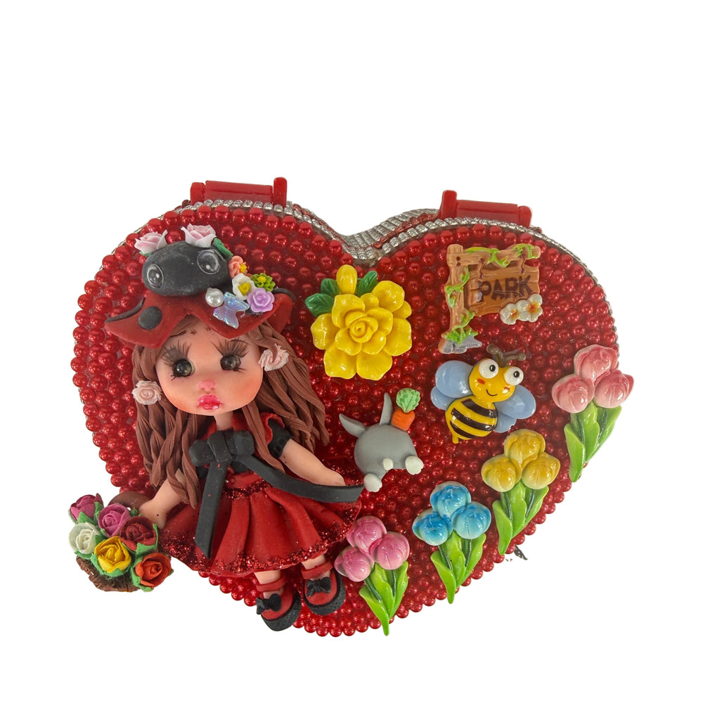Heart-shaped jewelry box with handmade doll, flowers, bee, and butterfly fairy details for girls
