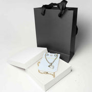 Heart and teddy bear jewelry set in white box with black gift bag