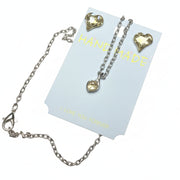 close up Heart crystal necklace and earring jewelry set displayed in a white gift box with a luxury black gift bag