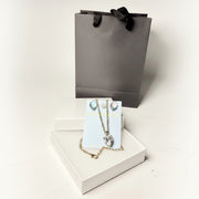 Handmade crystal necklace and earring jewelry set in a white gift box with a luxury back gift bag