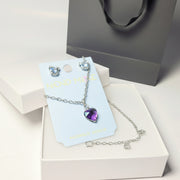 Silver-tone crystal necklace and earring jewelry set in a white gift box with a luxury black gift bag