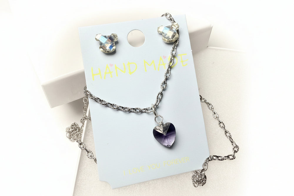 Silver-tone crystal necklace and earring jewelry set in a white gift box with a luxury gray gift bag