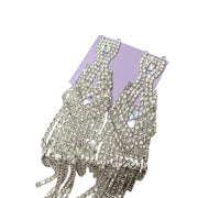 Close-up of sparkling rhinestone dangle earrings featuring a brilliant cascading crystal design for formal events