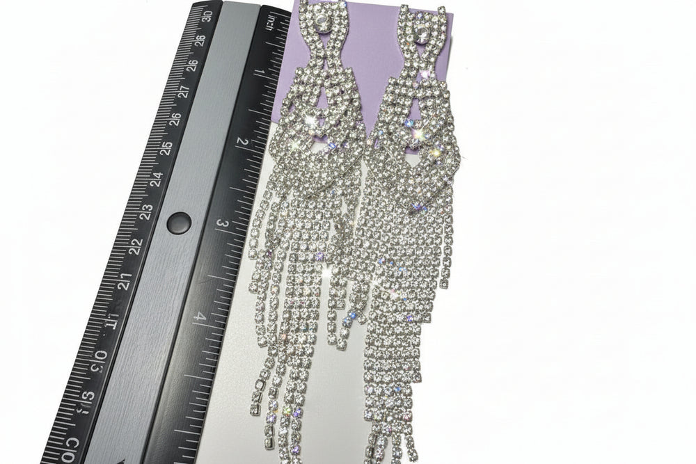 Premium jewelry gift set with long rhinestone earrings and high-quality packaging ready for gifting