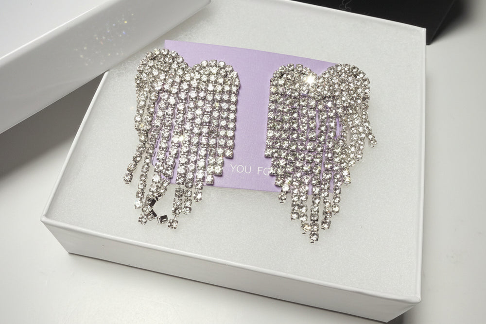 Premium jewelry gift set featuring sparkly rhinestone earrings and high-quality packaging ready for gifting.