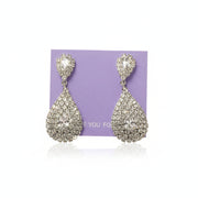 Elegant drop earrings with brilliant sparkle on jewelry box - Sophisticated accessory for formal events and anniversaries