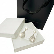 Luxury silver-tone crystal teardrop earrings displayed with premium white gift box and black bag - Gift-ready jewelry set