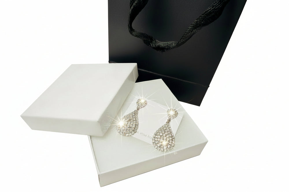 Luxury silver-tone crystal teardrop earrings displayed with premium white gift box and black bag - Gift-ready jewelry set