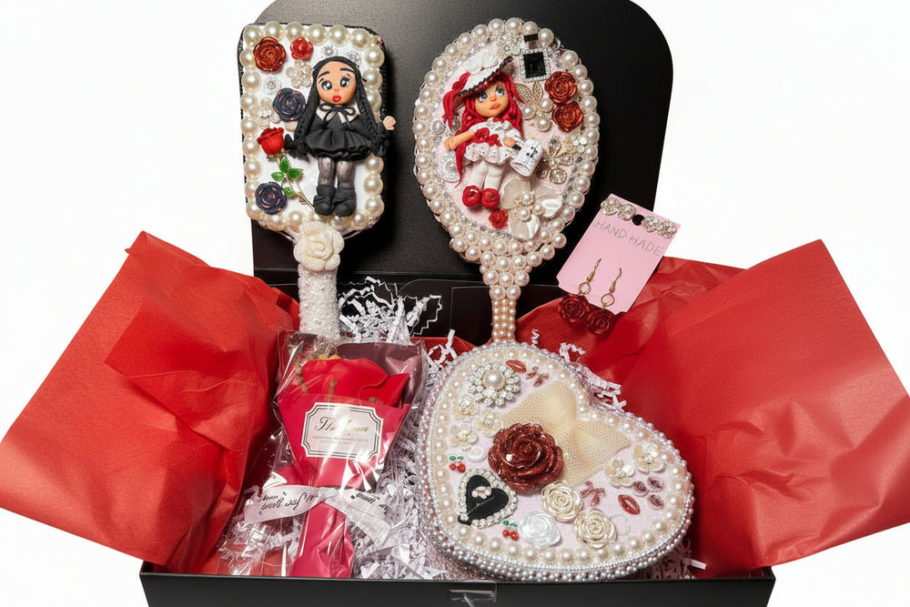 Handmade Decoden vanity set featuring a decorated mirror, hair brush, jewelry box with cold porcelain doll, red soap roses, and artisan earrings.