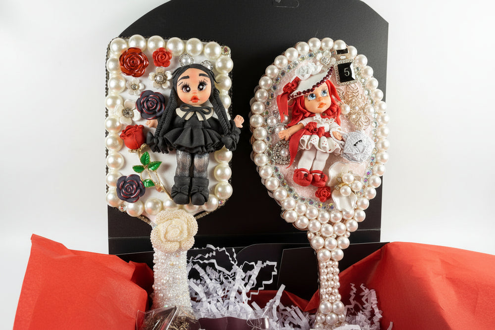 Handmade Decoden vanity set featuring a decorated mirror, hair brush, jewelry box with cold porcelain doll, red soap roses, and artisan earrings.