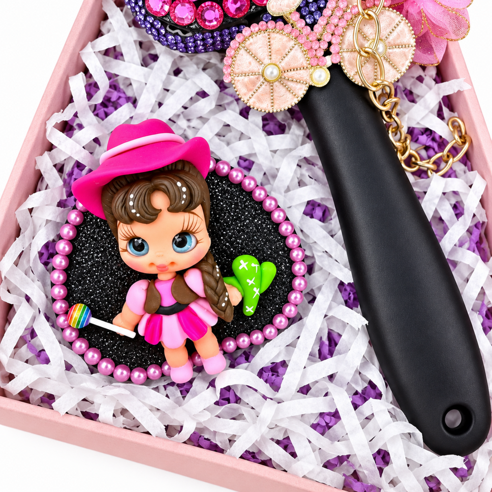 Kawaii gift set with decorated black hairbrush, pink clay figure, purple mini purse, gold chain, and pink cowgirl accent.
