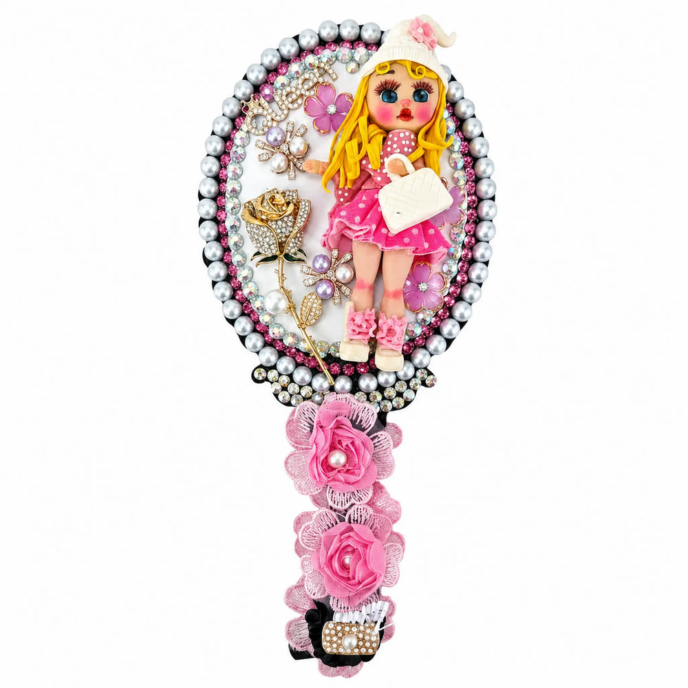 Kawaii hand mirror with cold porcelain doll, pink dress, pearls, rhinestones, flowers, and gold rose detail.