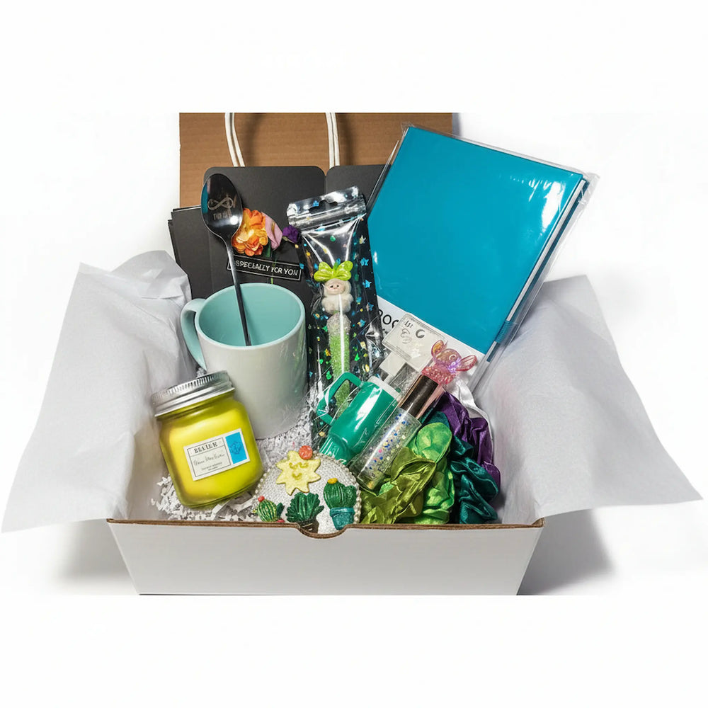 Kawaii teal gift box for women with journal, mug, candle and accessories